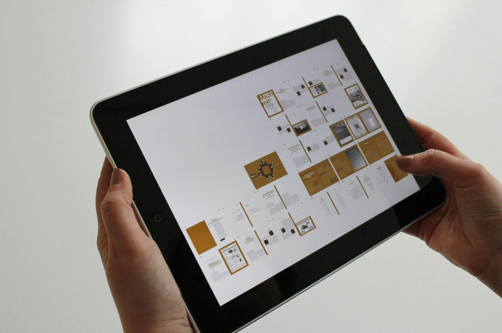 Image of a well designed user interface being reviewed on a hand held iPad device.